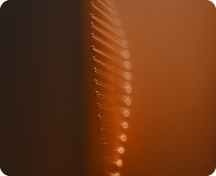 An orange-tinted profile portrait.